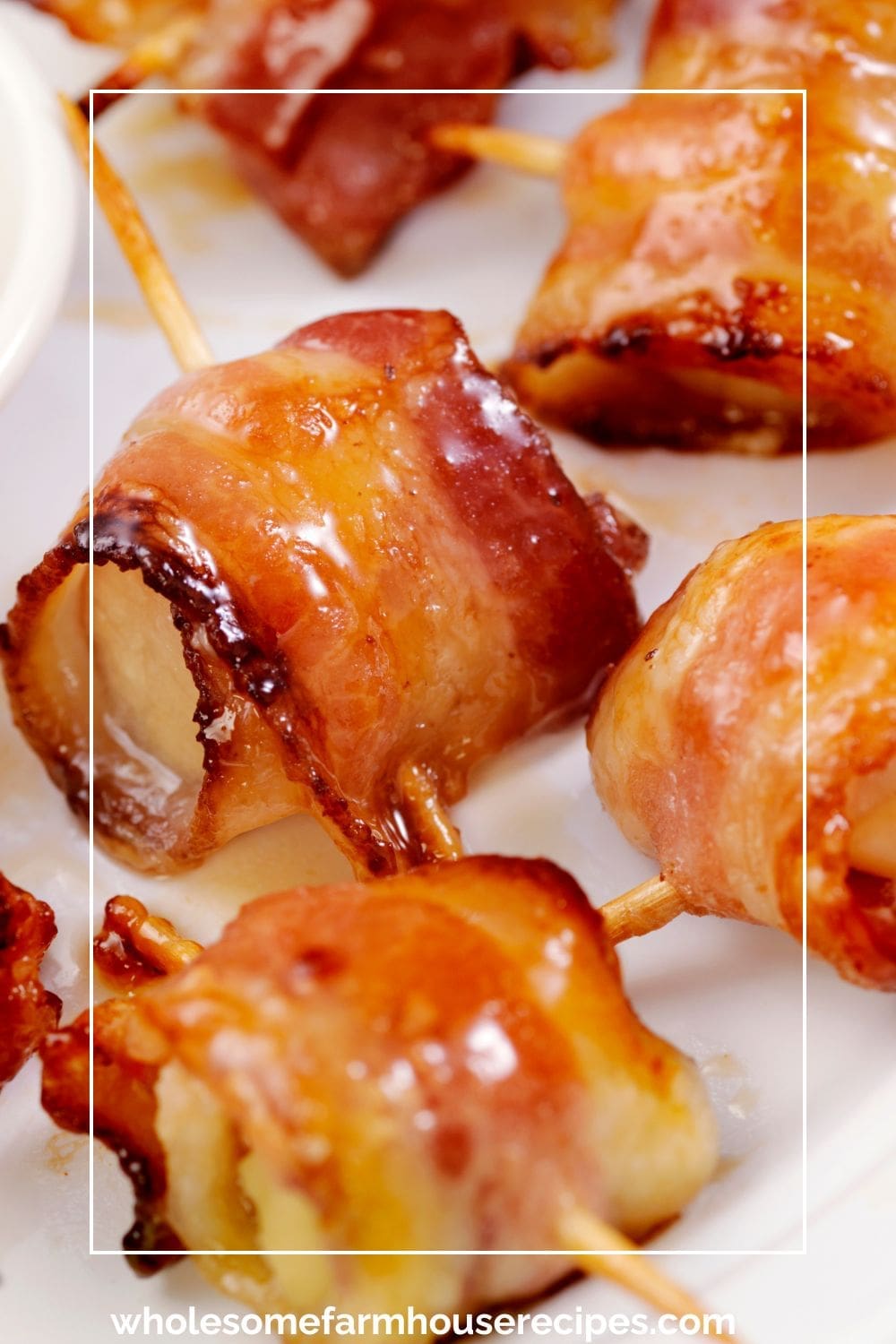 Bacon Wrapped Scallops glazed with maple syrup